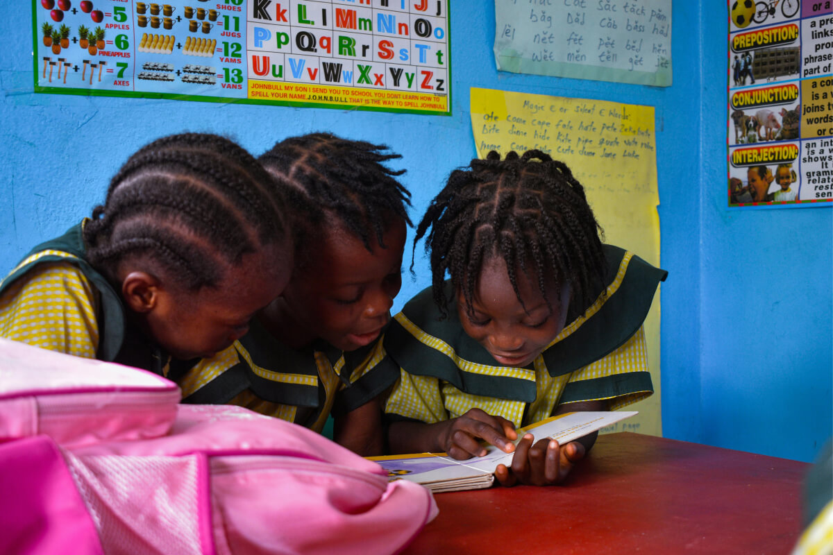 Young students doing an assignment together